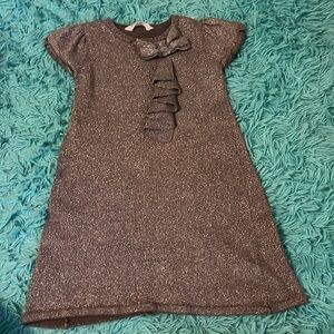 Girls shimmery dress with ruffles.
